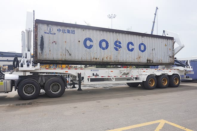 China Container Side Loader Price for Sale in Ghana - Полуприцеп-контейнеровоз/ Сменный кузов: фото 1 China Container Side Loader Price for Sale in Ghana - Полуприцеп-контейнеровоз/ Сменный кузов: фото 1
