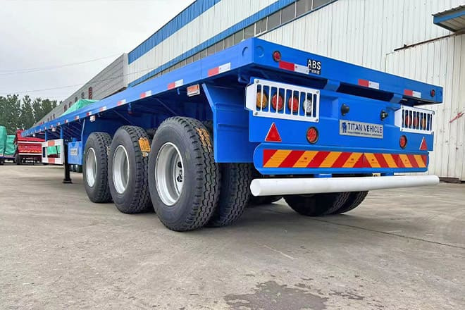 TITAN 3 Axle Flatbed Semi Trailer Manufacturers for Sale in Ghana - Полуприцеп бортовой/ Платформа: фото 5 TITAN 3 Axle Flatbed Semi Trailer Manufacturers for Sale in Ghana - Полуприцеп бортовой/ Платформа: фото 5