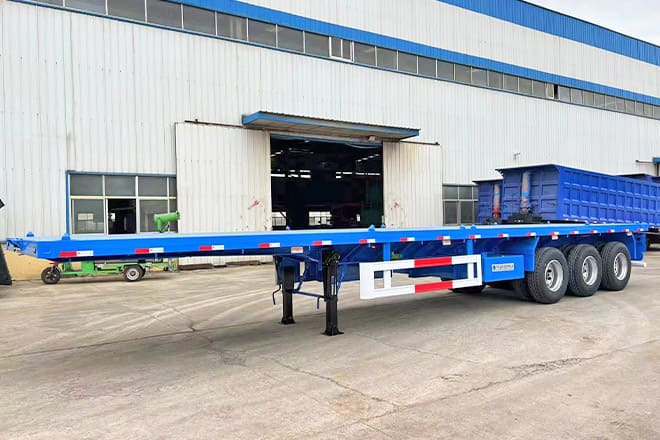 TITAN 3 Axle Flatbed Semi Trailer Manufacturers for Sale in Ghana - Полуприцеп бортовой/ Платформа: фото 1 TITAN 3 Axle Flatbed Semi Trailer Manufacturers for Sale in Ghana - Полуприцеп бортовой/ Платформа: фото 1