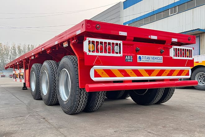 TITAN 3 Axle Flatbed Trailer for Sale in Senegal - Полуприцеп бортовой/ Платформа: фото 1 TITAN 3 Axle Flatbed Trailer for Sale in Senegal - Полуприцеп бортовой/ Платформа: фото 1