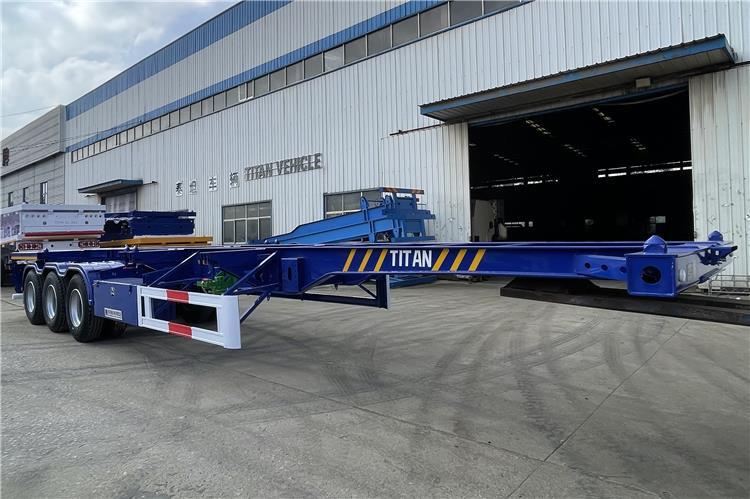 TITAN 40ft Container Chassis Trailer for Sale In Guam - Полуприцеп-контейнеровоз/ Сменный кузов: фото 3 TITAN 40ft Container Chassis Trailer for Sale In Guam - Полуприцеп-контейнеровоз/ Сменный кузов: фото 3