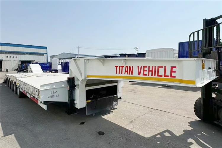 Новый Низкорамный полуприцеп TITAN 5 Axle 100 Ton Low Bed Trailer for Sale In Tanzania: фото 5 Новый Низкорамный полуприцеп TITAN 5 Axle 100 Ton Low Bed Trailer for Sale In Tanzania: фото 5