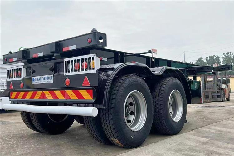 TITAN In Stock 20 ft Shipping Container Trailer for Sale In Ghana - Полуприцеп-контейнеровоз/ Сменный кузов: фото 4 TITAN In Stock 20 ft Shipping Container Trailer for Sale In Ghana - Полуприцеп-контейнеровоз/ Сменный кузов: фото 4