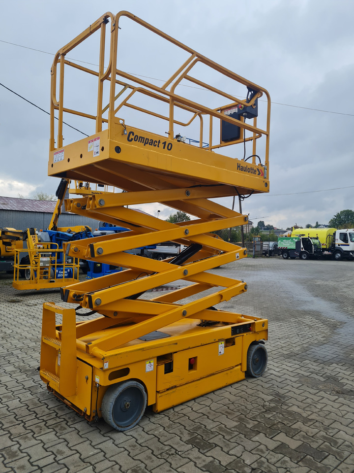 Haulotte Compact 10 - Ножничный подъемник: фото 1 Haulotte Compact 10 - Ножничный подъемник: фото 1