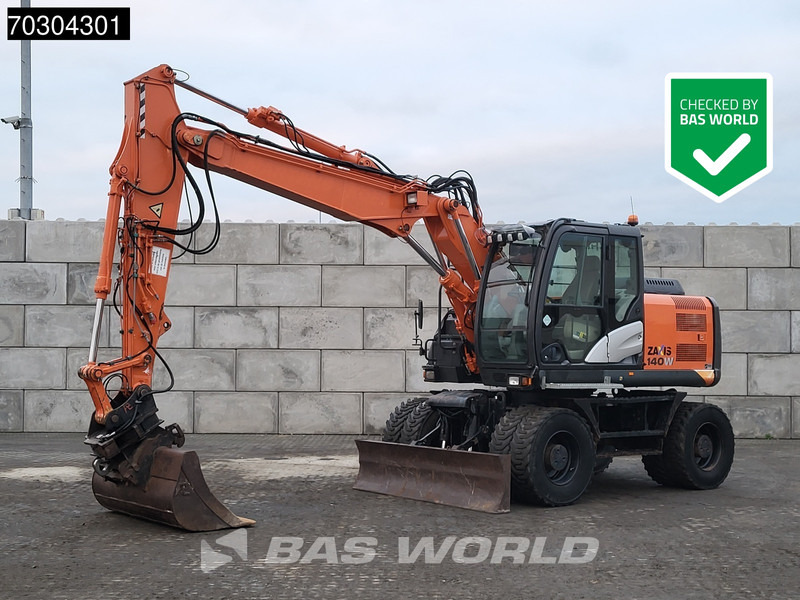 Hitachi ZX140W -5 - Колёсный экскаватор: фото 1 Hitachi ZX140W -5 - Колёсный экскаватор: фото 1