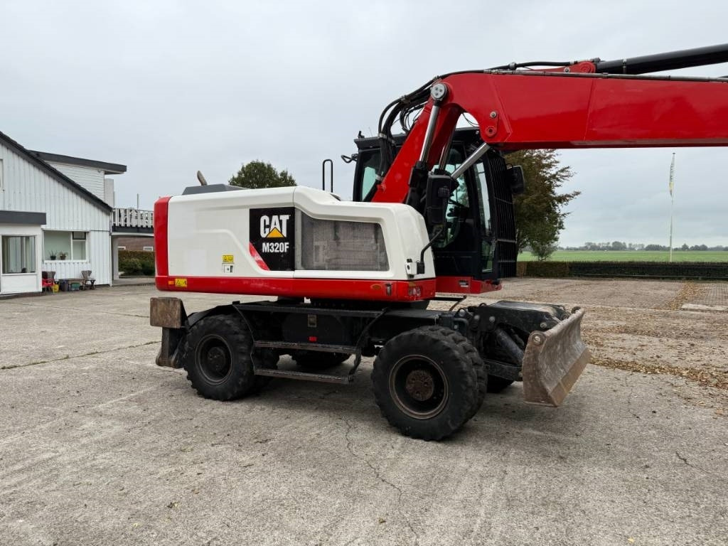 CAT M320F - Колёсный экскаватор: фото 5 CAT M320F - Колёсный экскаватор: фото 5