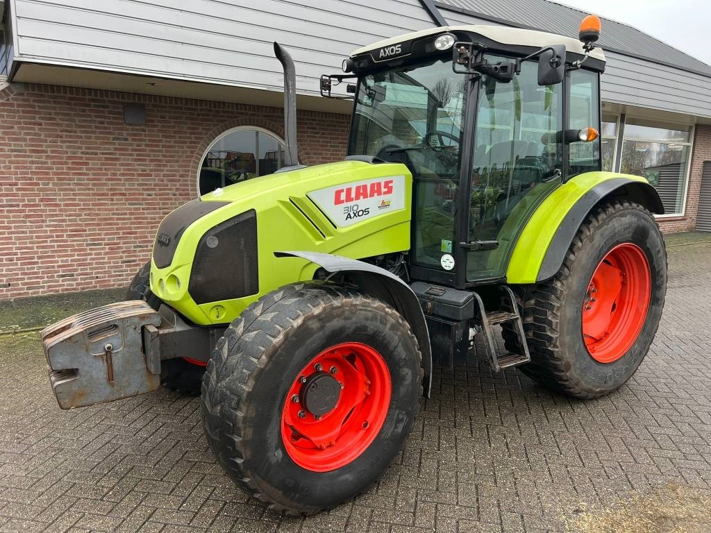 Claas Axos 310 - Трактор: фото 1 Claas Axos 310 - Трактор: фото 1