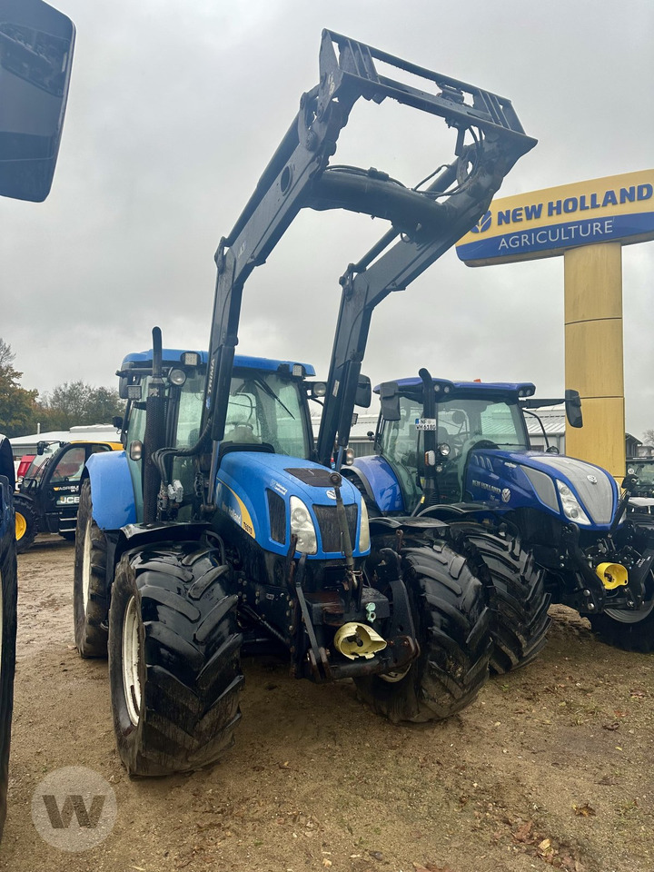 New Holland T 6070 - Трактор: фото 1 New Holland T 6070 - Трактор: фото 1