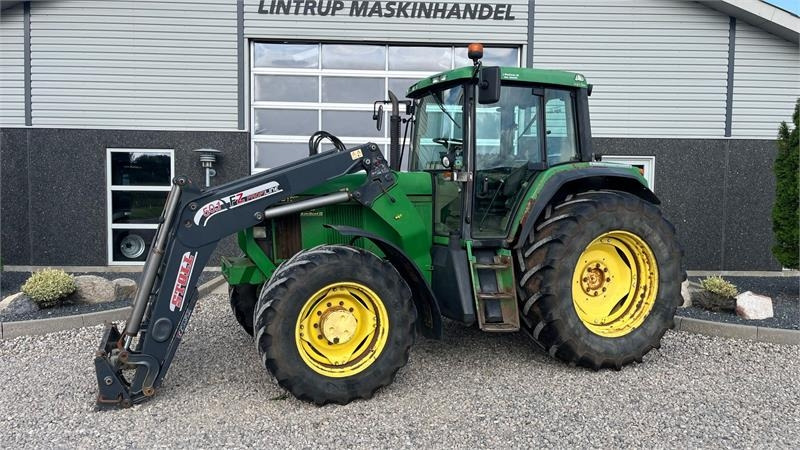 John Deere 6910 Auto Quad II-TLS Med frontlæsser - Трактор: фото 1 John Deere 6910 Auto Quad II-TLS Med frontlæsser - Трактор: фото 1