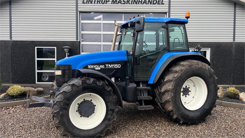 New Holland TM150 Med frontlift - Трактор: фото 1 New Holland TM150 Med frontlift - Трактор: фото 1