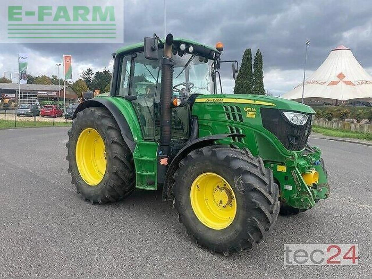 Трактор John Deere 6115m: фото 9