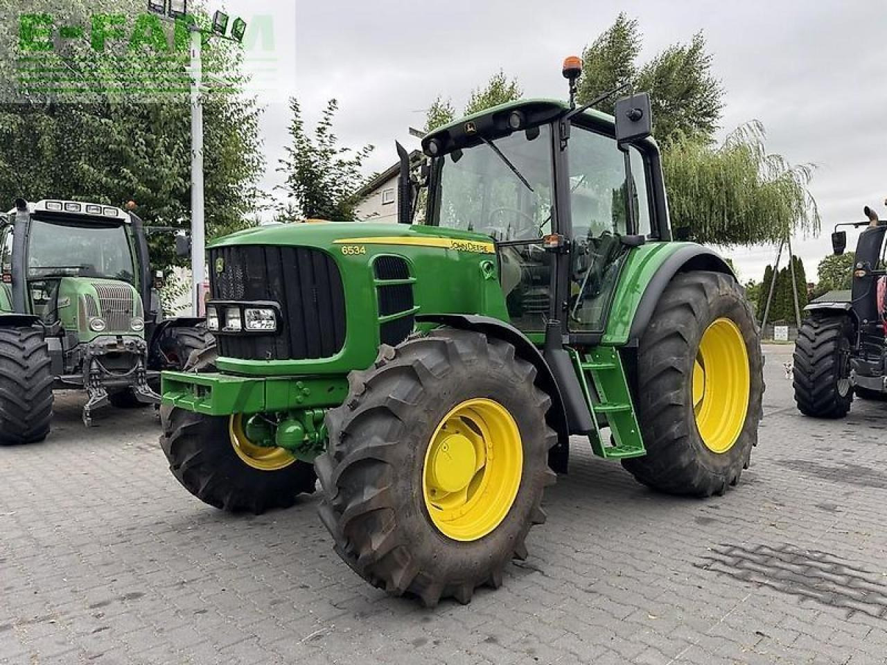 John Deere 6534 - Трактор: фото 1 John Deere 6534 - Трактор: фото 1