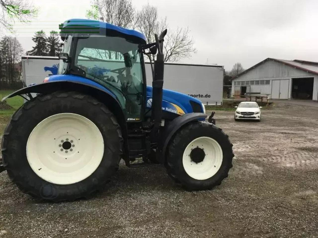 Трактор New Holland t 6020: фото 6