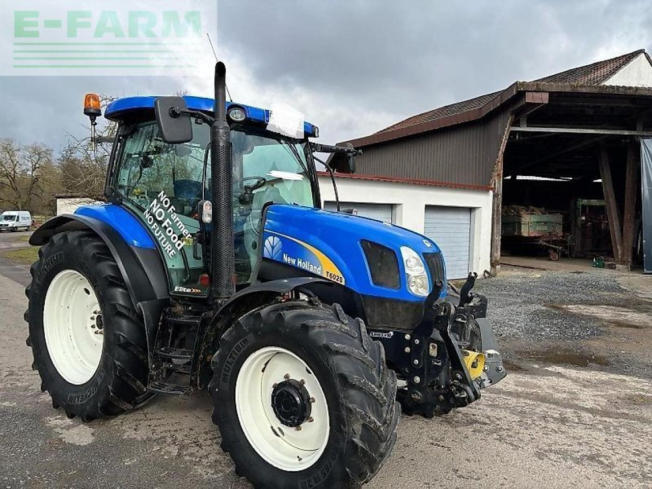 New Holland t 6020 elite Elite - Трактор: фото 2 New Holland t 6020 elite Elite - Трактор: фото 2