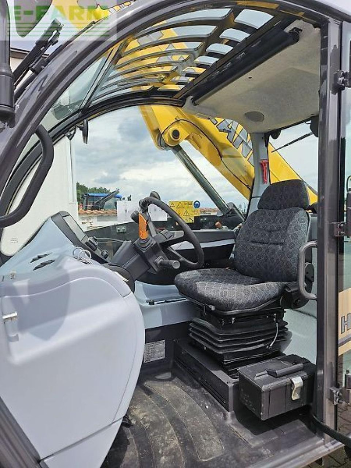 Телескопический погрузчик New Holland th 7.42 plus: фото 7 Телескопический погрузчик New Holland th 7.42 plus: фото 7