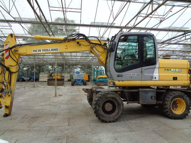 New Holland MH 4.6 - Колёсный экскаватор: фото 3 New Holland MH 4.6 - Колёсный экскаватор: фото 3