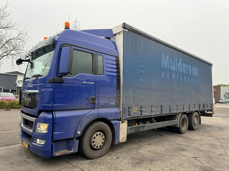 MAN TGX 26.400 6X2 - EURO 4 + LIFT + STEERING AXLE - Тентованный грузовик: фото 1 MAN TGX 26.400 6X2 - EURO 4 + LIFT + STEERING AXLE - Тентованный грузовик: фото 1