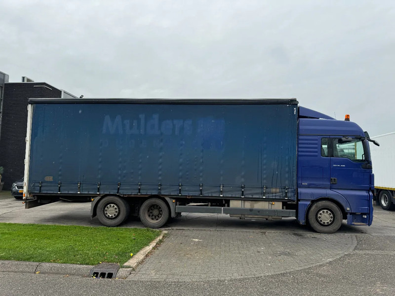 MAN TGX 26.400 6X2 - EURO 4 + LIFT + STEERING AXLE + TÜV 10-2025 - Тентованный грузовик: фото 4 MAN TGX 26.400 6X2 - EURO 4 + LIFT + STEERING AXLE + TÜV 10-2025 - Тентованный грузовик: фото 4