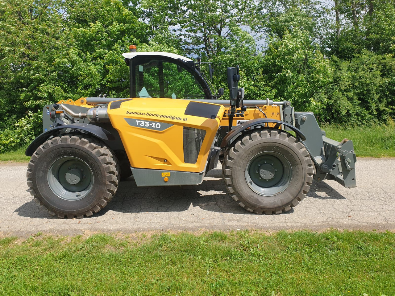 LIEBHERR T 33-10 - Телескопический погрузчик: фото 2 LIEBHERR T 33-10 - Телескопический погрузчик: фото 2