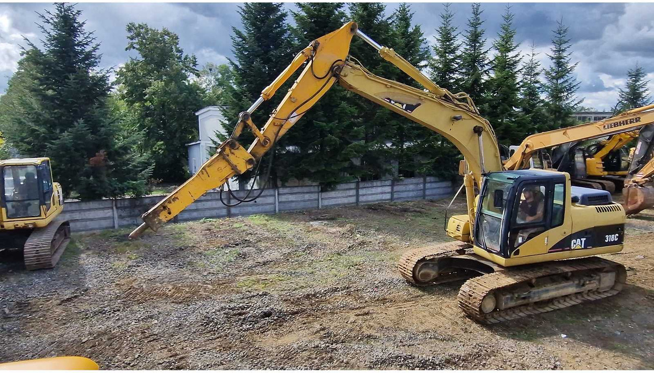 Caterpillar 318C - Гусеничный экскаватор: фото 4 Caterpillar 318C - Гусеничный экскаватор: фото 4