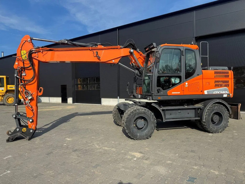 Doosan DX140-5 2018 - Колёсный экскаватор: фото 2 Doosan DX140-5 2018 - Колёсный экскаватор: фото 2