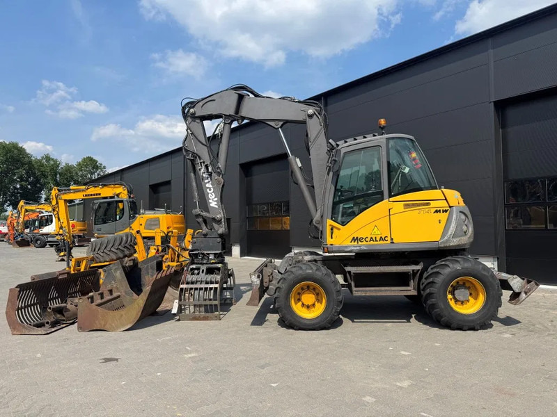 Mecalac 714MW FULL ATTACHMENTS OVERCOMPLEET !!! - Колёсный экскаватор: фото 1 Mecalac 714MW FULL ATTACHMENTS OVERCOMPLEET !!! - Колёсный экскаватор: фото 1