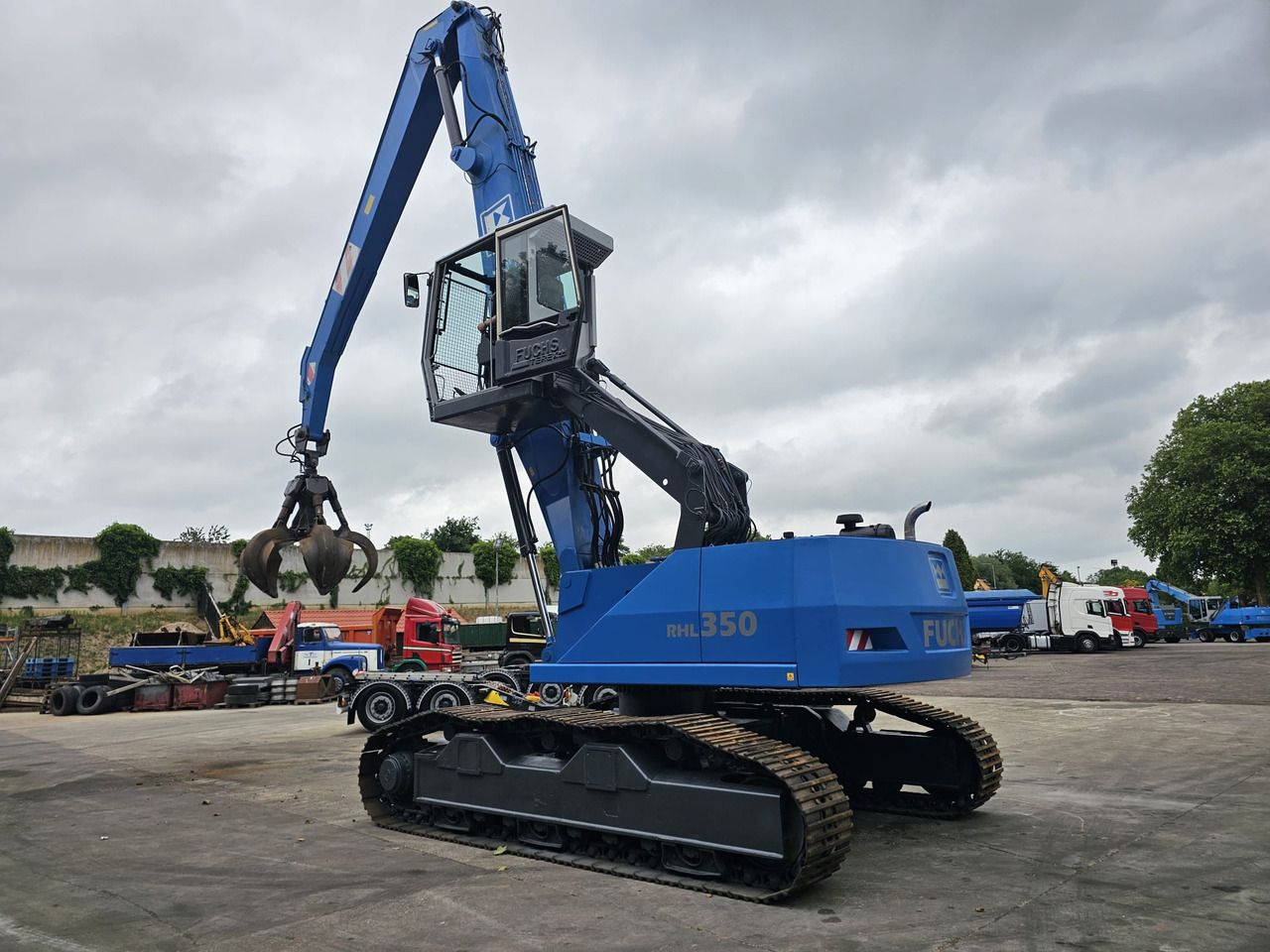 Fuchs RHL 350 Materialhandler With Adjustable Tracks - Перегружатель: фото 4 Fuchs RHL 350 Materialhandler With Adjustable Tracks - Перегружатель: фото 4
