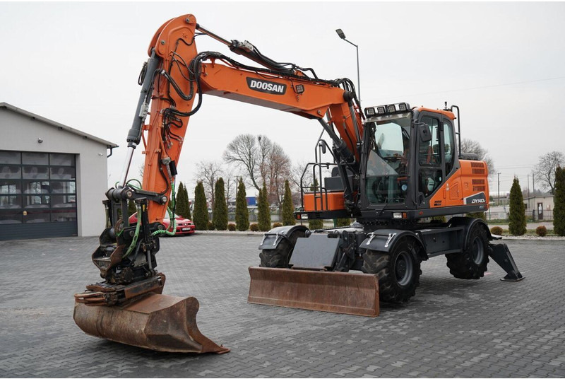 Doosan DX 140W - Колёсный экскаватор: фото 1 Doosan DX 140W - Колёсный экскаватор: фото 1