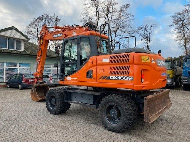 Doosan DX 160 W-3 - Колёсный экскаватор: фото 4 Doosan DX 160 W-3 - Колёсный экскаватор: фото 4