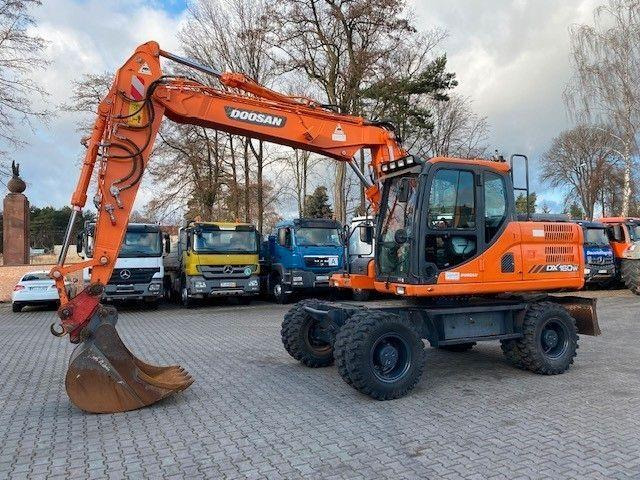 Doosan DX 160 W-3 - Колёсный экскаватор: фото 1 Doosan DX 160 W-3 - Колёсный экскаватор: фото 1