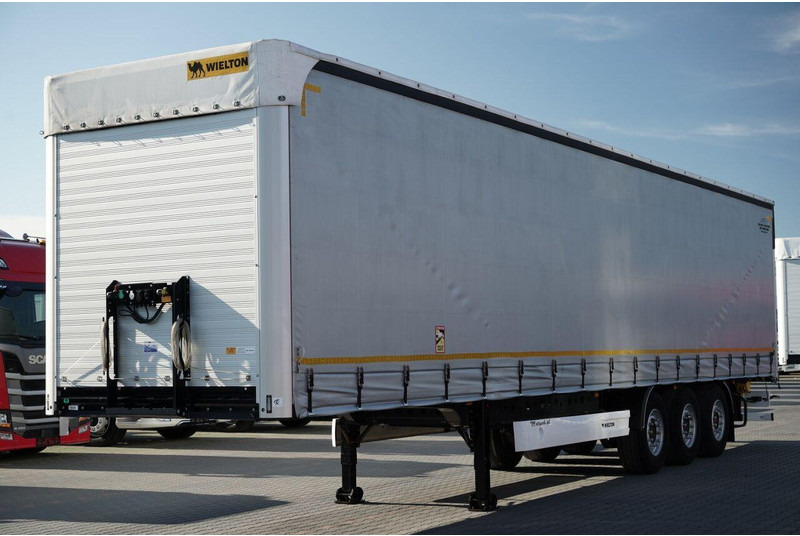 Wielton FIRANKA / STANDARD / OŚ PODNOSZONA / DACH PODNOSZONY / SAF - Тентованный полуприцеп: фото 3 Wielton FIRANKA / STANDARD / OŚ PODNOSZONA / DACH PODNOSZONY / SAF - Тентованный полуприцеп: фото 3