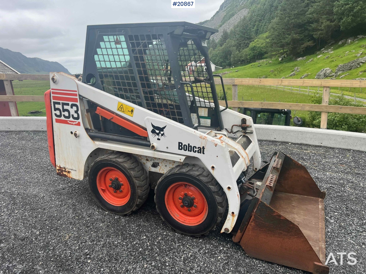 Bobcat 553 - Мини-погрузчик с бортовым поворотом: фото 3 Bobcat 553 - Мини-погрузчик с бортовым поворотом: фото 3