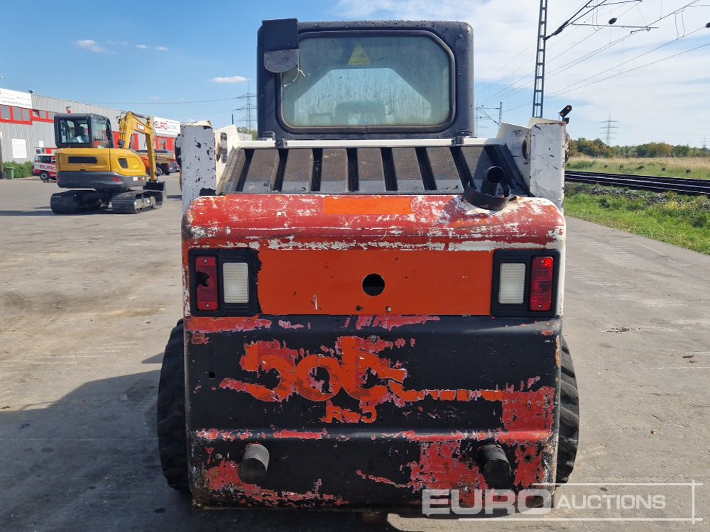 Bobcat 763 - Мини-погрузчик с бортовым поворотом: фото 4 Bobcat 763 - Мини-погрузчик с бортовым поворотом: фото 4