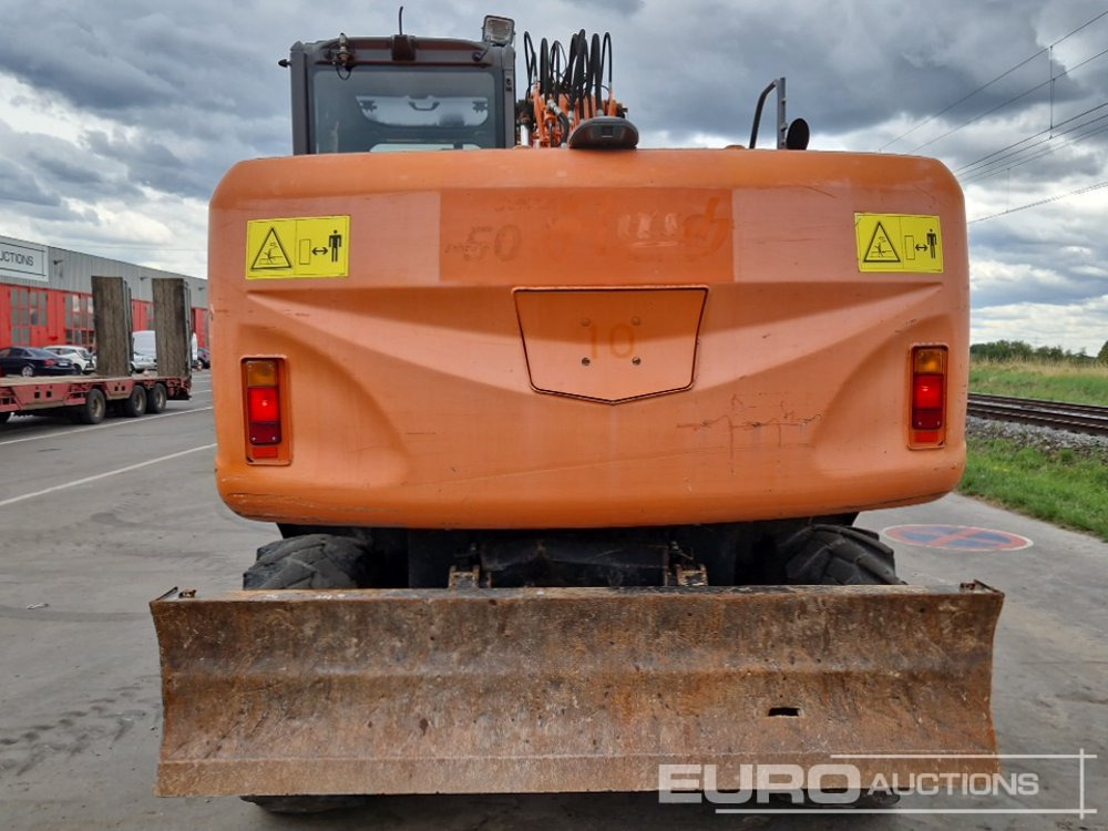 Hitachi ZX140W-3 - Колёсный экскаватор: фото 4 Hitachi ZX140W-3 - Колёсный экскаватор: фото 4