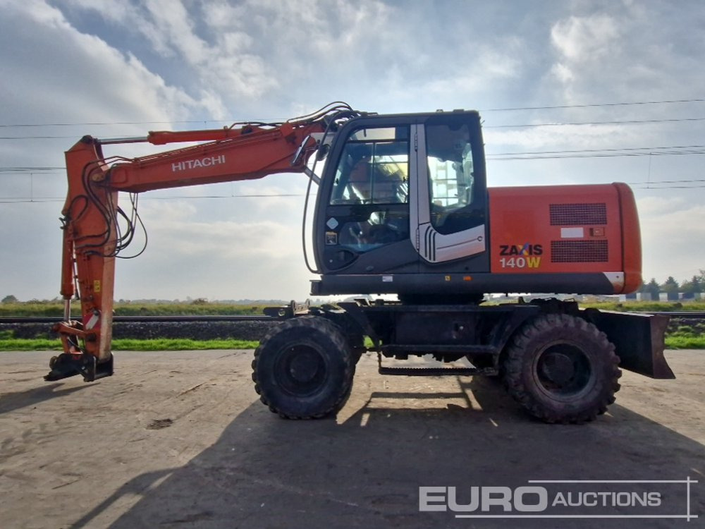 Hitachi ZX140W-3 - Колёсный экскаватор: фото 2 Hitachi ZX140W-3 - Колёсный экскаватор: фото 2