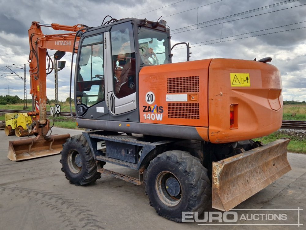 Hitachi ZX140W-3 - Колёсный экскаватор: фото 3 Hitachi ZX140W-3 - Колёсный экскаватор: фото 3
