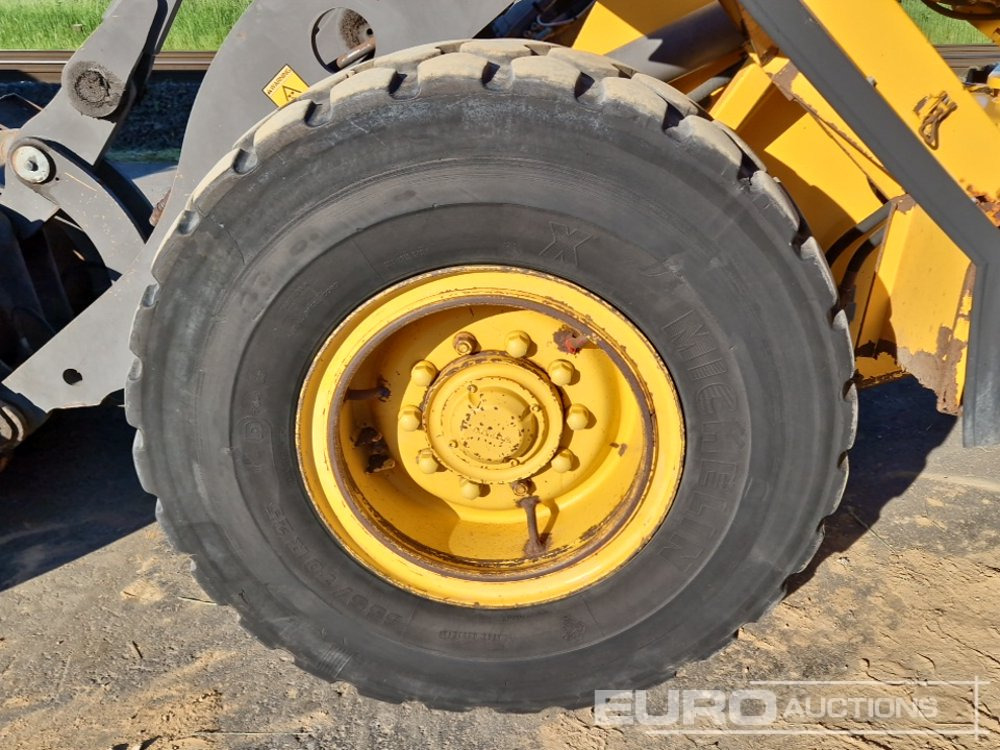 Колёсный погрузчик Volvo L70D: фото 9