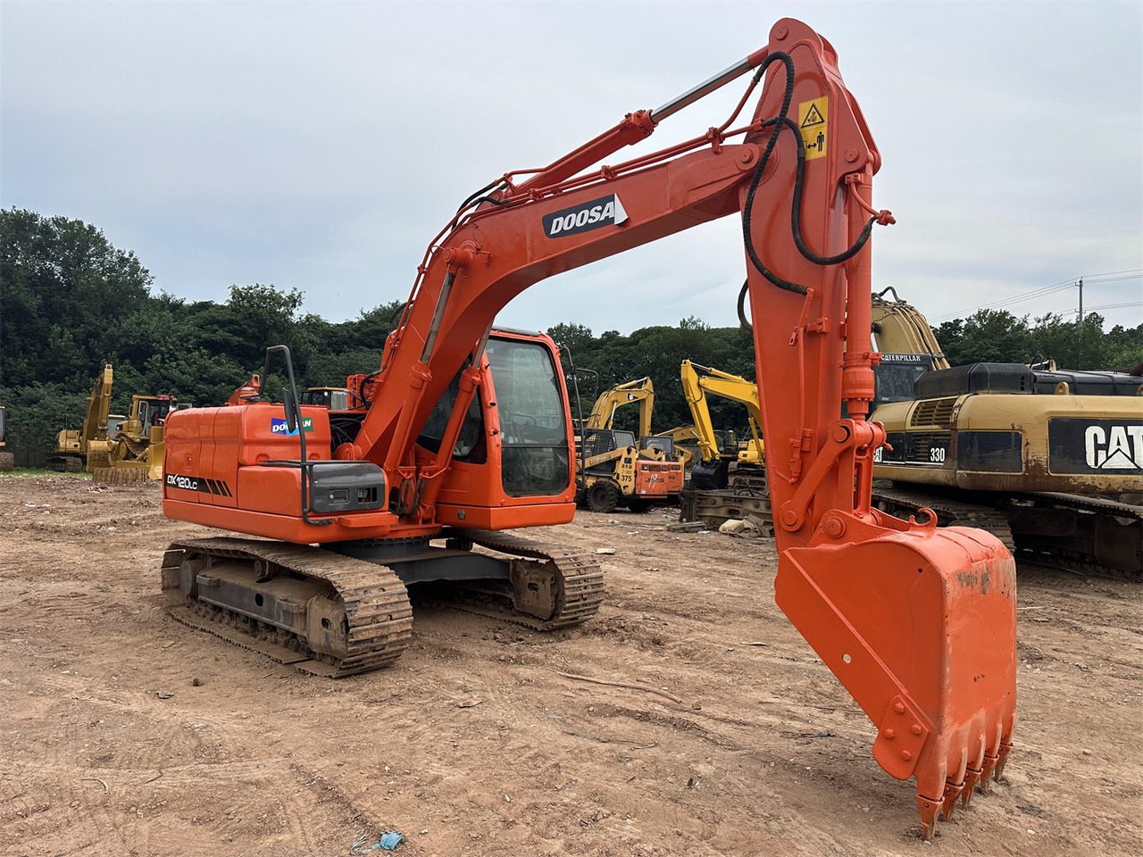 Doosan DX120 - Гусеничный экскаватор: фото 2 Doosan DX120 - Гусеничный экскаватор: фото 2