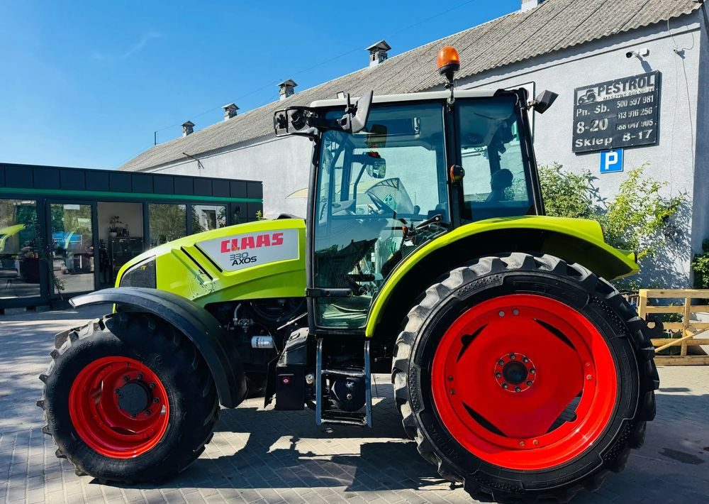 Claas Axos 330 - Трактор: фото 2 Claas Axos 330 - Трактор: фото 2