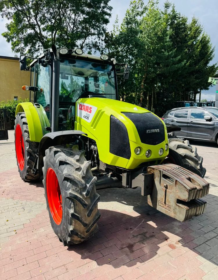 Claas Axos 330 - Трактор: фото 1 Claas Axos 330 - Трактор: фото 1