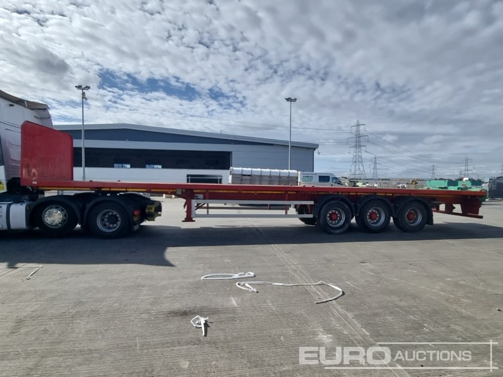 2010 Dennison Tri-Axle - Полуприцеп бортовой/ Платформа: фото 2 2010 Dennison Tri-Axle - Полуприцеп бортовой/ Платформа: фото 2