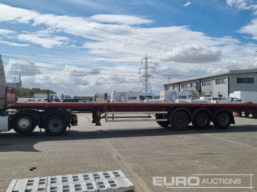 2011 Dennison Tri Axle Flatbed Trailer - Полуприцеп бортовой/ Платформа: фото 2 2011 Dennison Tri Axle Flatbed Trailer - Полуприцеп бортовой/ Платформа: фото 2