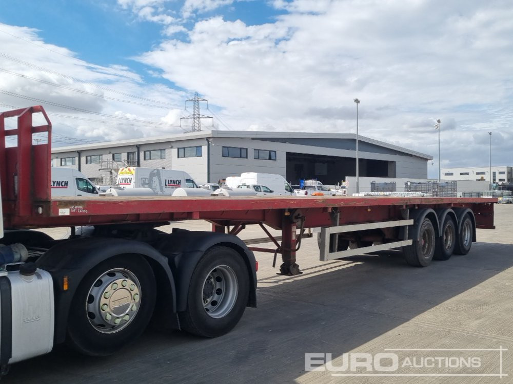 2011 Dennison Tri Axle Flatbed Trailer - Полуприцеп бортовой/ Платформа: фото 1 2011 Dennison Tri Axle Flatbed Trailer - Полуприцеп бортовой/ Платформа: фото 1