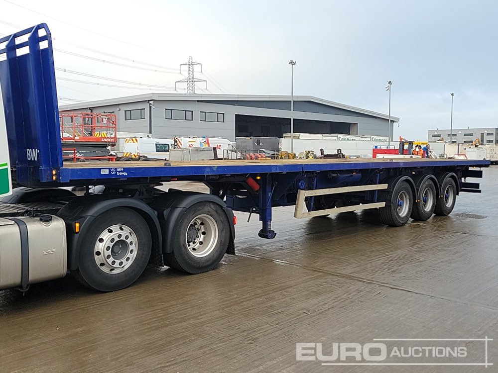 SDC Trailers Tri Axle Extendable Flatbed Trailer, Twist Locks - Полуприцеп бортовой/ Платформа: фото 1 SDC Trailers Tri Axle Extendable Flatbed Trailer, Twist Locks - Полуприцеп бортовой/ Платформа: фото 1