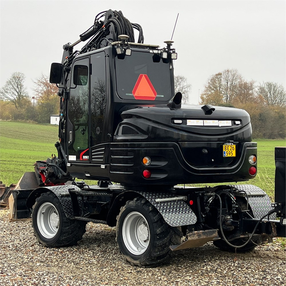 Takeuchi TB295 W - Колёсный экскаватор: фото 5 Takeuchi TB295 W - Колёсный экскаватор: фото 5