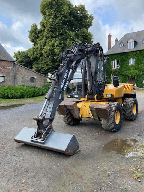 Mecalac 12 MXT - Колёсный экскаватор: фото 5 Mecalac 12 MXT - Колёсный экскаватор: фото 5