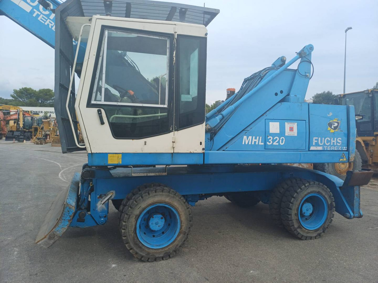 FUCHS MHL320 - Колёсный экскаватор: фото 1 FUCHS MHL320 - Колёсный экскаватор: фото 1