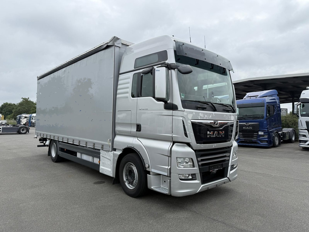 MAN 18.430 LL TGX E6 (Tauliner) - Тентованный грузовик: фото 1 MAN 18.430 LL TGX E6 (Tauliner) - Тентованный грузовик: фото 1