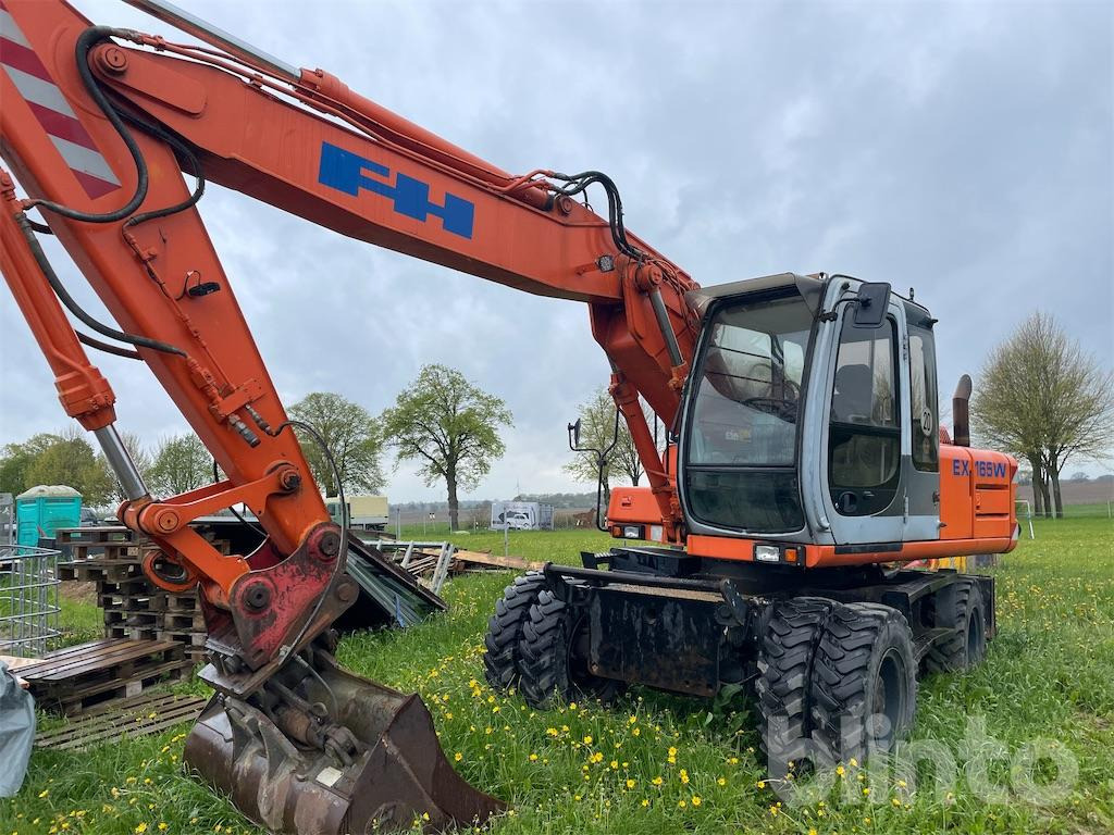 Fiat-Hitachi EX 165 W (2003) - Колёсный экскаватор: фото 1 Fiat-Hitachi EX 165 W (2003) - Колёсный экскаватор: фото 1