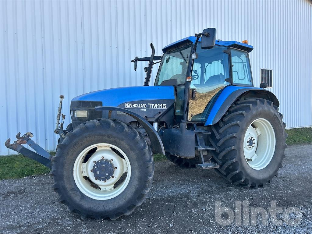 New Holland TM115 (2001) - Трактор: фото 1 New Holland TM115 (2001) - Трактор: фото 1